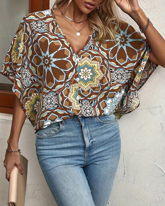Retro printed V-neck button half sleeve blouse