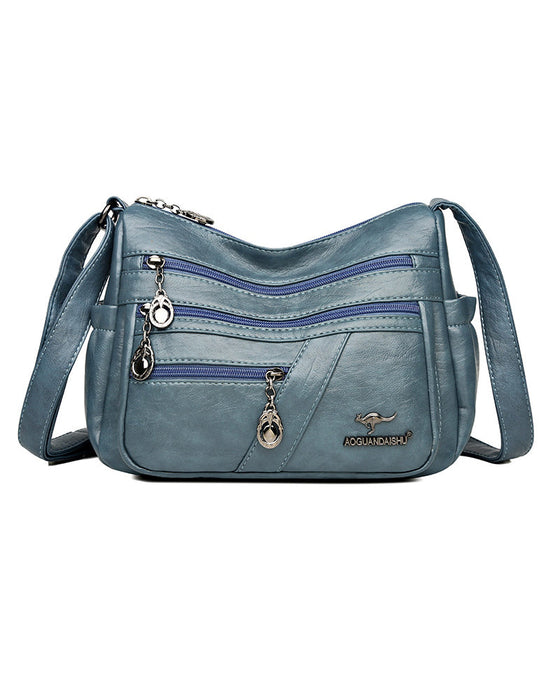 Multi-pocket soft leather crossbody bag
